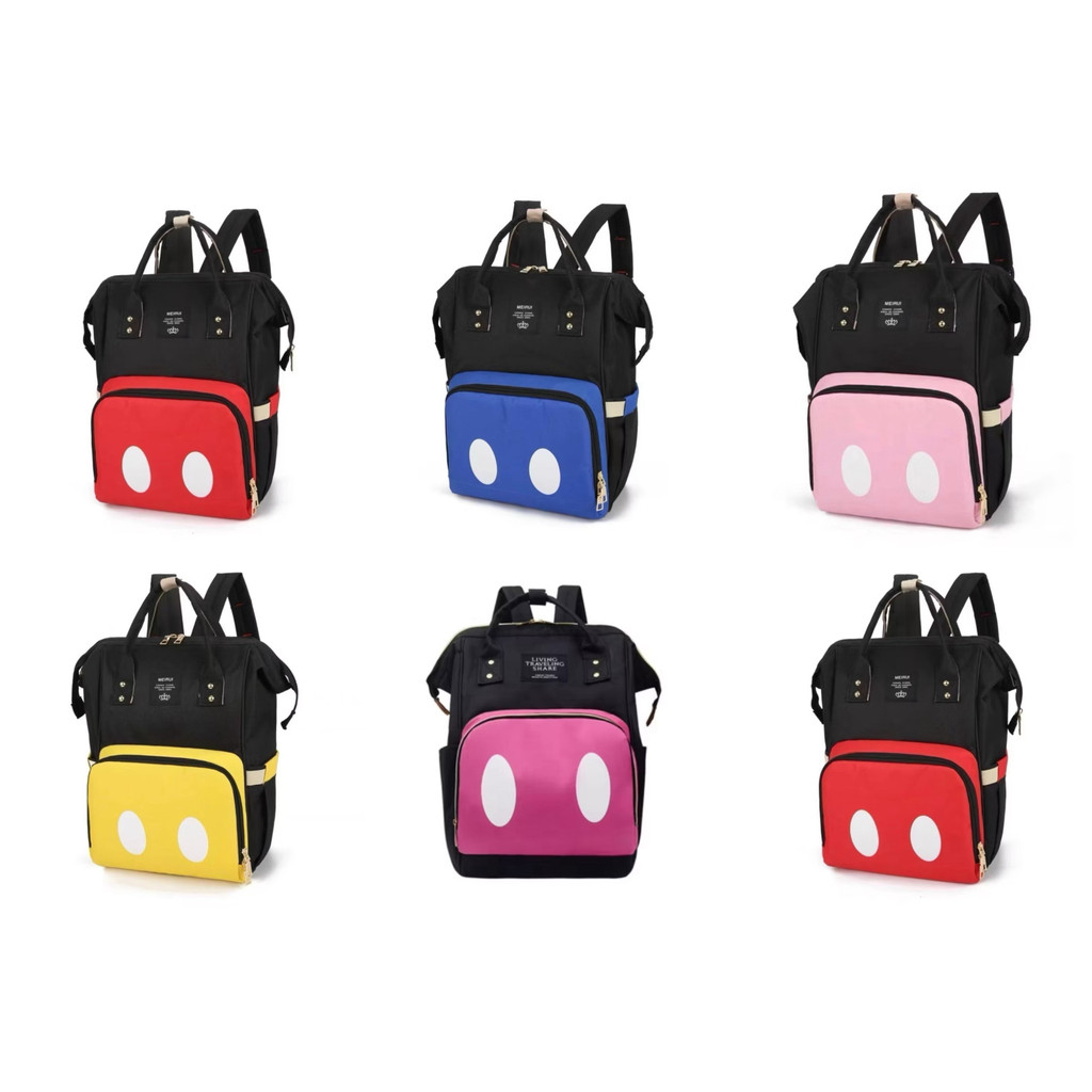 Seis mochilas de maternidade pretas com bolsos coloridos e círculos brancos