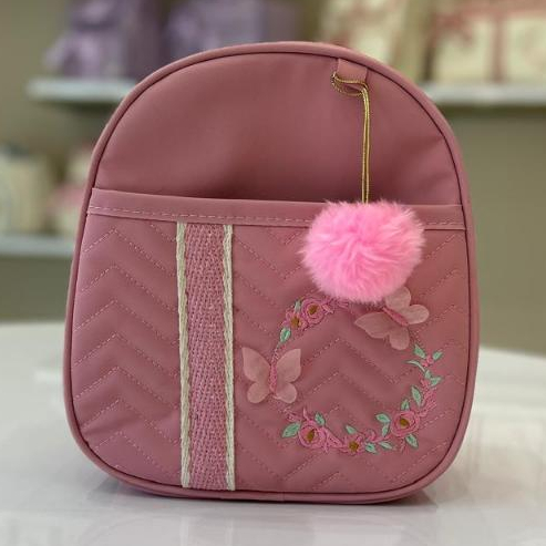 Bolsa Maternidade Borboleta pequena com laço rosa de lado