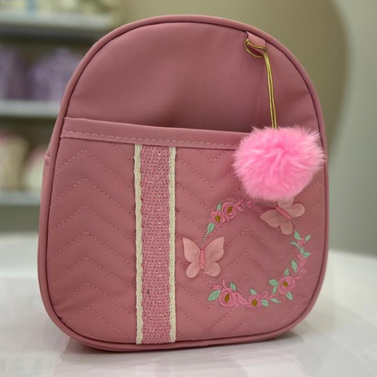 Bolsa Maternidade Borboleta pequena com laço rosa de perto