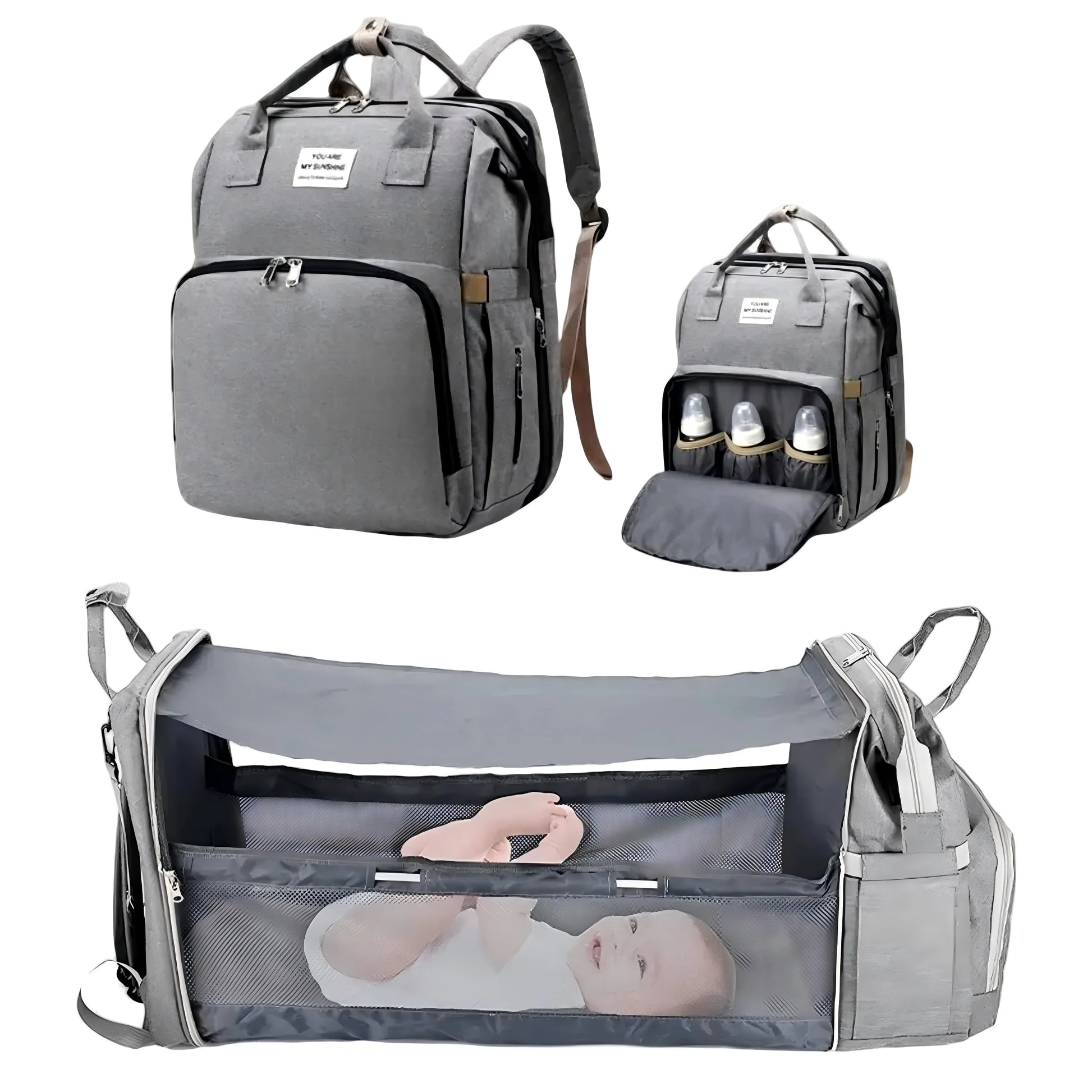 Mochila maternidade cinza mostrada fechada, com mamadeiras e aberta como berço portátil.