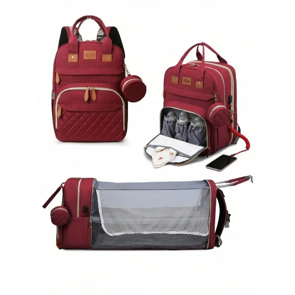 Mochila maternidade vinho mostrada fechada, com bolsos abertos e estendida como berço portátil.