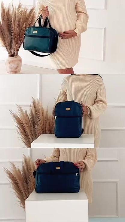 Kit com três bolsas de maternidade azul-escuro: mochila, mala grande e bolsa média.