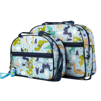 Duas bolsas arredondadas azuis com estampas de dinossauros em vista frontal.